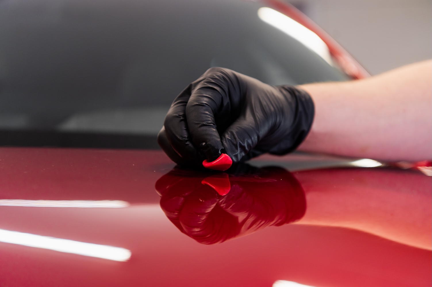 Hand In Glove Polishing Car S Exterior Surface